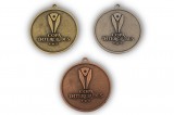 9. Medalla en tres baños, latón, cobre y níquel.